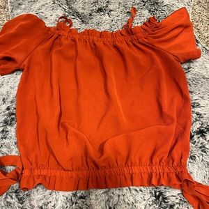 Orange side tie blouse